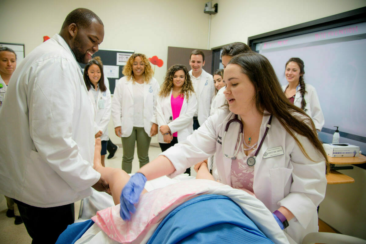 SHPEP Nursing Rotation Students in the nursing simulation lab during a birth simulation..