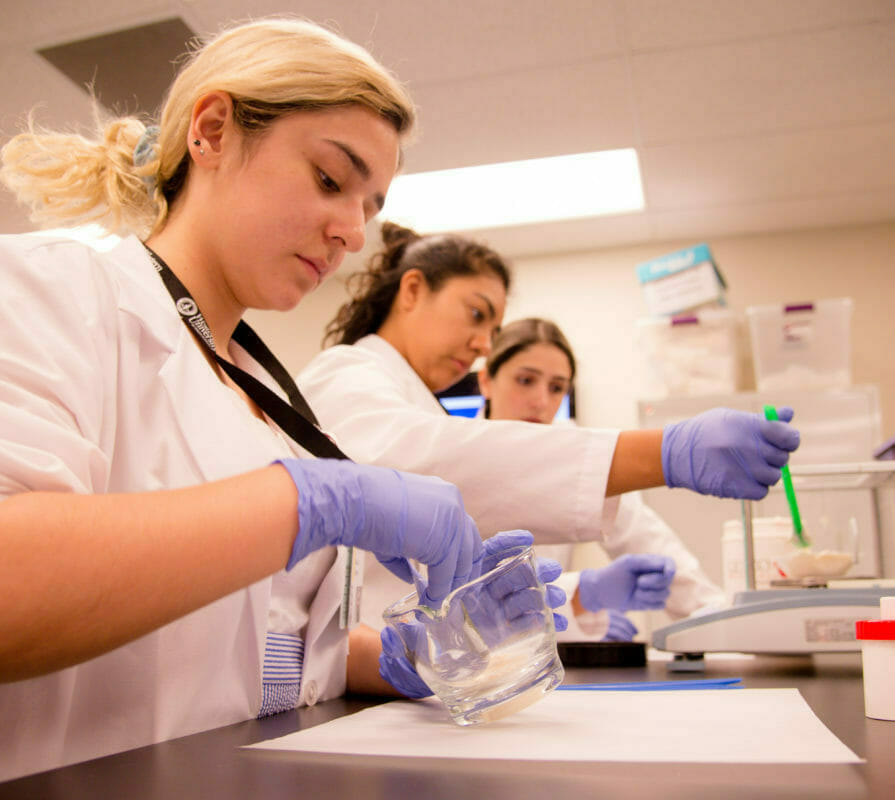 WesternU Summer Health Professions Education Program (SHPEP) students participate in a hands-on workshop making hand cream and lip balm in the WesternU College of Pharmacy Compounding Lab. WesternU is one of 13 institutions nationwide hosting SHPEP, encouraging underrepresented students to enter health professions. (Jeff Malet, WesternU)#westernushpep #shpep #westernuway #pharmacy #SHPEPConnect